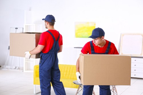 Office relocation planning in Kingston upon Thames with moving boxes and workplace furniture
