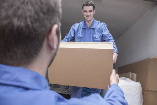 Packed boxes and furniture ready for transport in a local home move