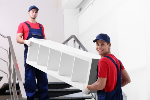 Movers Kingston Upon Thames team preparing a safe relocation with protective equipment