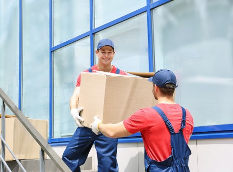 Preparing boxes and furniture for a move in Kingston