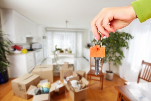 Careful handling of household items by a man and van team