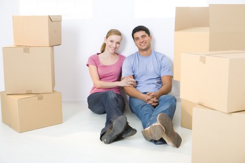 Loading furniture and boxes into a van for a Kingston move