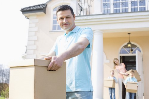 Careful loading of household items during a flat removal in Kingston upon Thames