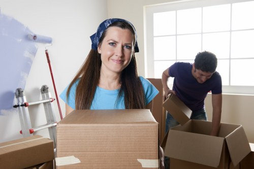Packed household boxes ready for removal in a Kingston property