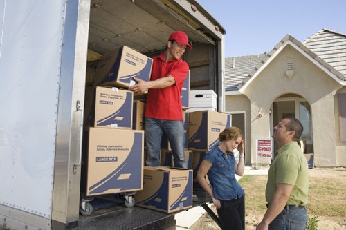 Professional movers handling access challenges in a local property
