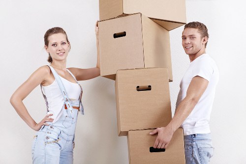 Professional movers handling furniture in a flat move